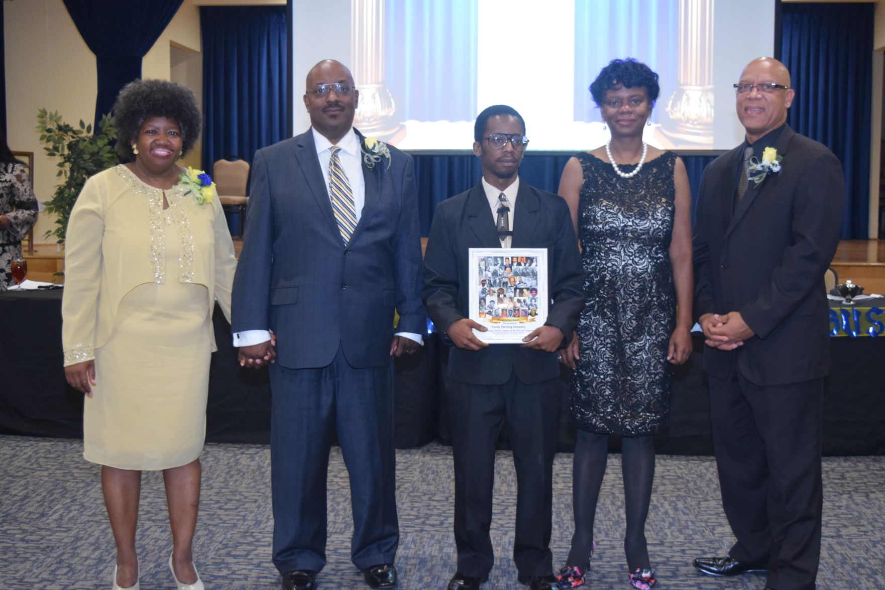 James Wiggins accepts Legacy Award for the Family Painting Company.